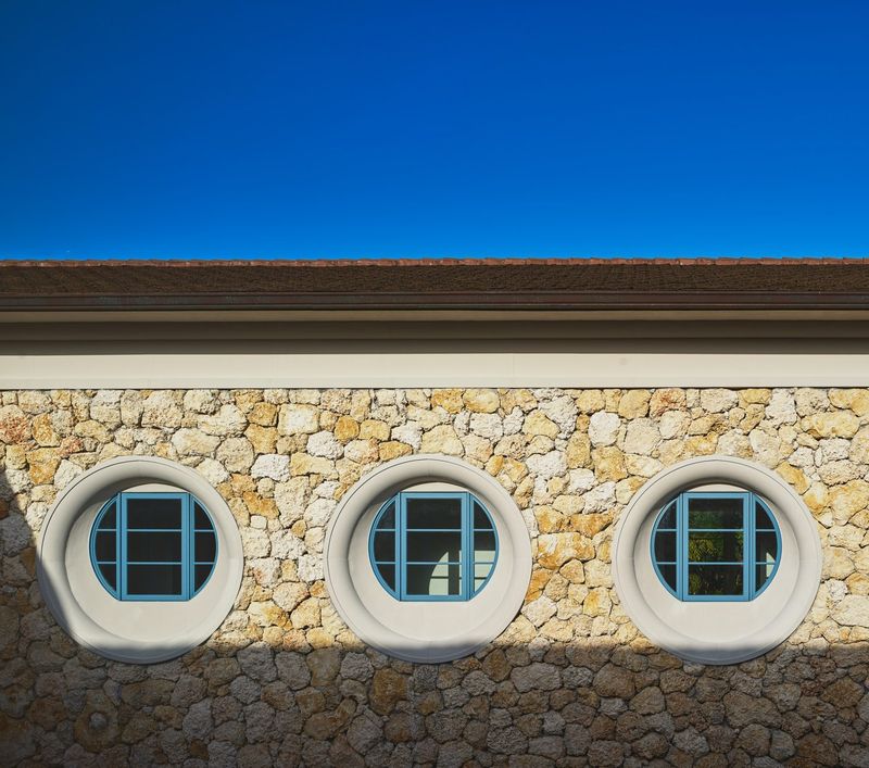 Coral-stone porthole windows